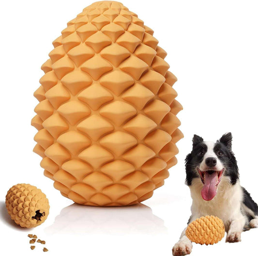 Dog playing with a large pinecone-shaped toy on a white background