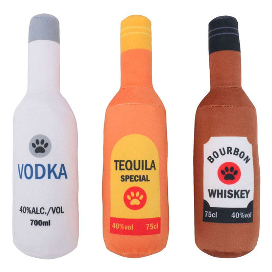 Three bottle-shaped toys labeled 'Vodka', 'Tequila Special', and 'Bourbon Whiskey' on a white background.
